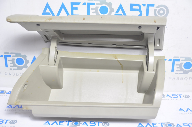 The glove compartment, glove box, upper compartment of the Toyota Prius V 12-17 beige