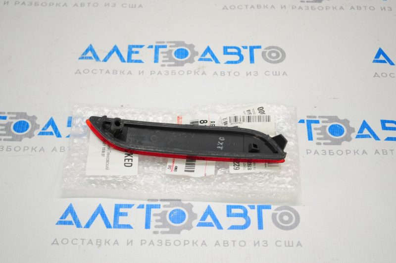 Rear bumper reflector left Toyota Camry v70 18-24