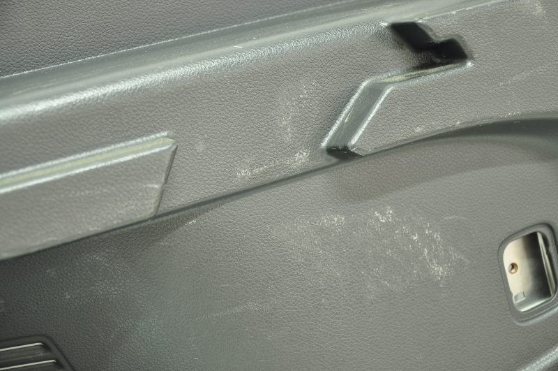 Left arch trim Nissan Rogue 14-18 black, under 2 rows, rubbed, scratches
