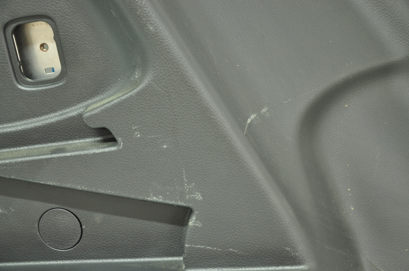 Left arch trim Nissan Rogue 14-18 black, under 2 rows, rubbed, scratches