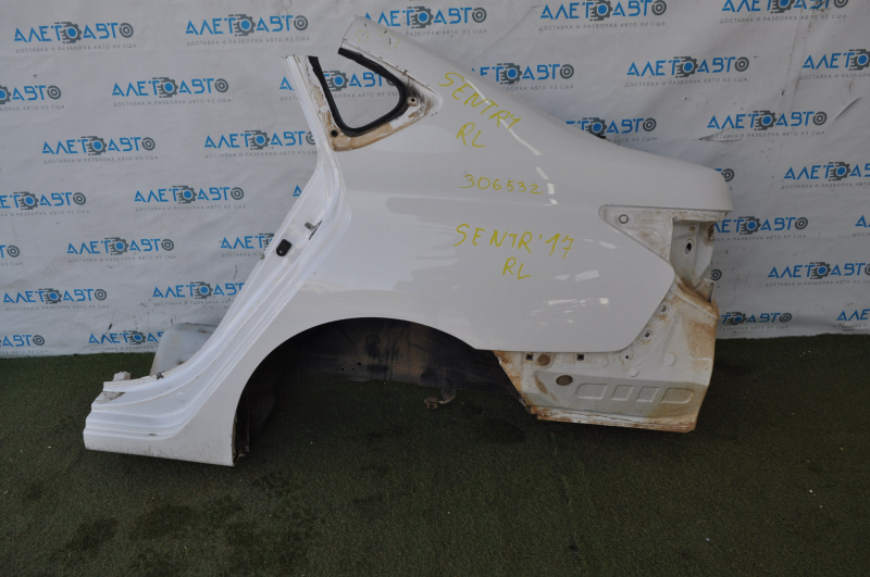 Quarter wing rear left Nissan Sentra 13-19 white, pokes
