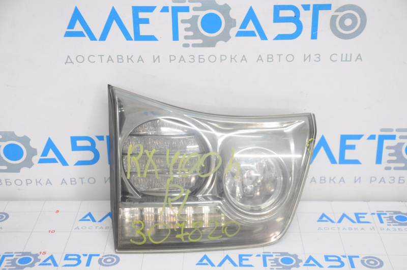 Inner taillight trunk lid left Lexus RX350 RX400h 06-07 rest dark, chip, chrome peeled off, broken guide