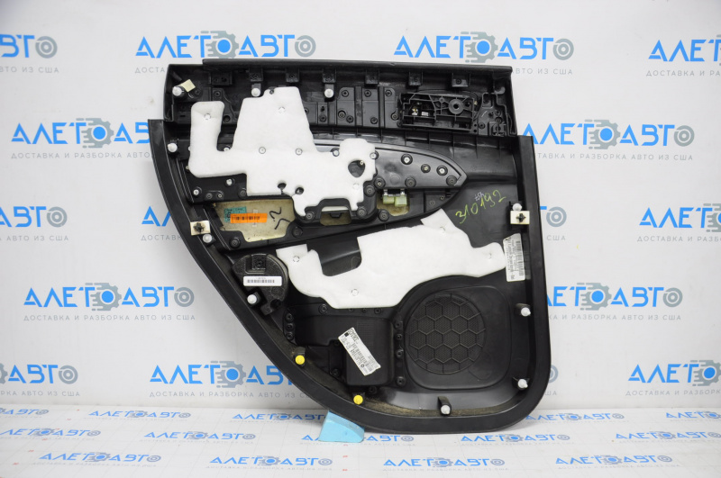 Door trim card rear right Jeep Grand Cherokee WK2 14-17 black with black insert leather, armrest leather, white stitching, molding with chrome, under matt black wood, scratches