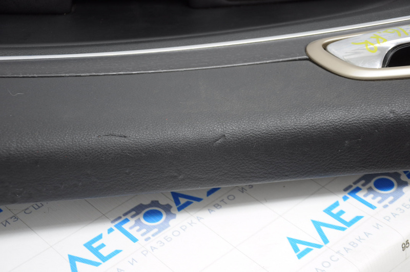 Door trim card rear right Jeep Grand Cherokee WK2 14-17 black with black insert leather, armrest leather, white stitching, molding with chrome, under matt black wood, scratches