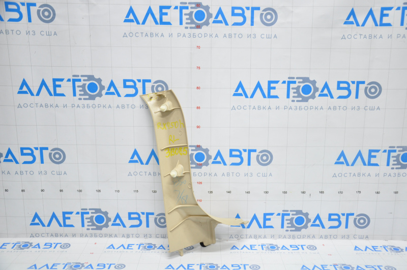 Left trunk opening trim Lexus RX350 RX450h 10-15 beige, broken crepe, whitened plastic