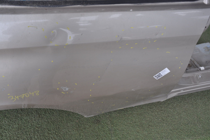 Quarter wing rear right Toyota Solara 2.4 04-08 gold dented, pokes
