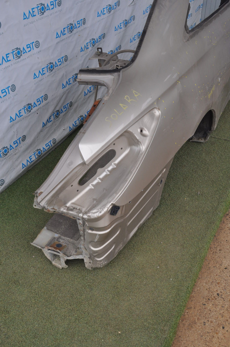 Quarter wing rear right Toyota Solara 2.4 04-08 gold dented, pokes