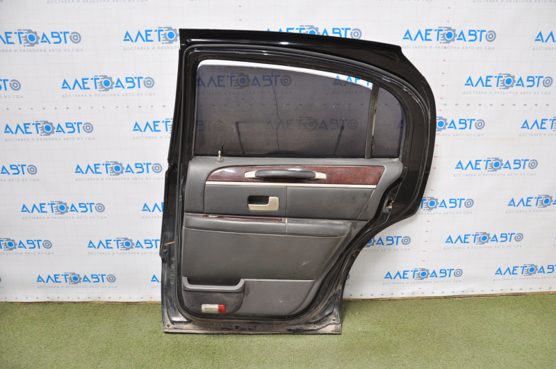 The door is bare rear right Lincoln Town Car 98-11 black, made, butt
