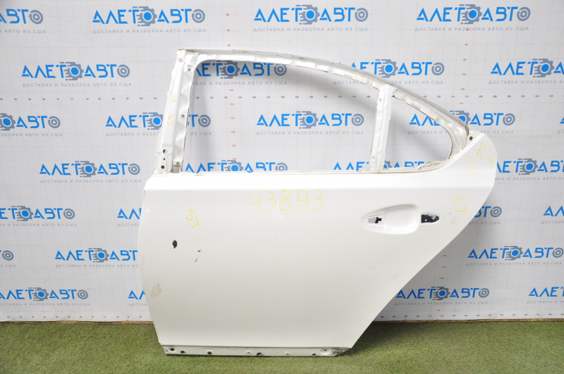 The door is bare, rear left, Lexus LS460 LS600h 07-17, white, dented on the inside near the lock.
