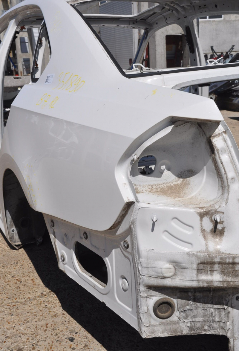 Quarter wing rear left VW Passat b7 12-15 USA white on body, bumps, dented