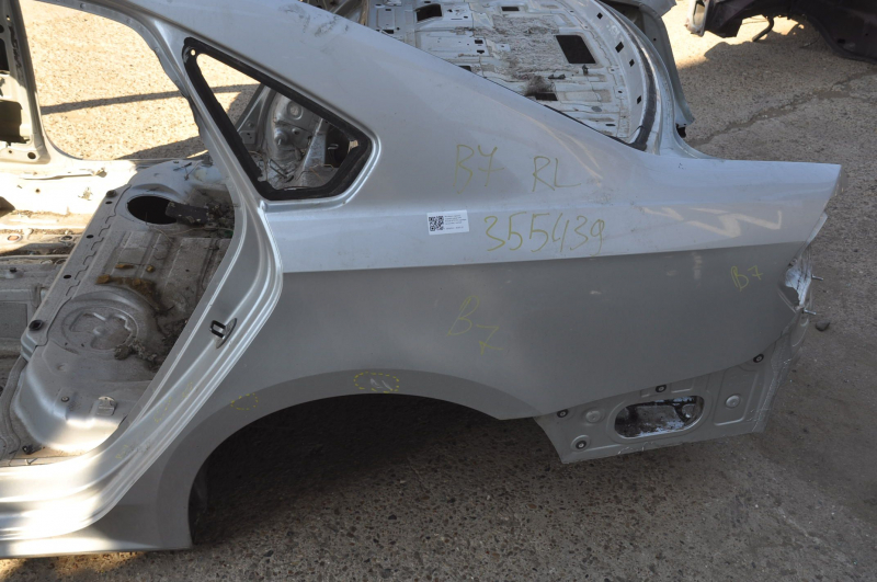 Quarter wing rear left VW Passat b7 12-15 USA silver on body, bumps