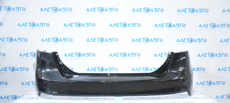 Rear bumper bare Ford Focus mk3 15-18 rest 4d black dented on the left, broken fasteners
