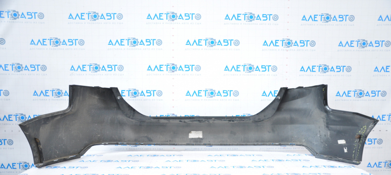 Rear bumper bare Ford Focus mk3 15-18 rest 4d black dented on the left, broken fasteners