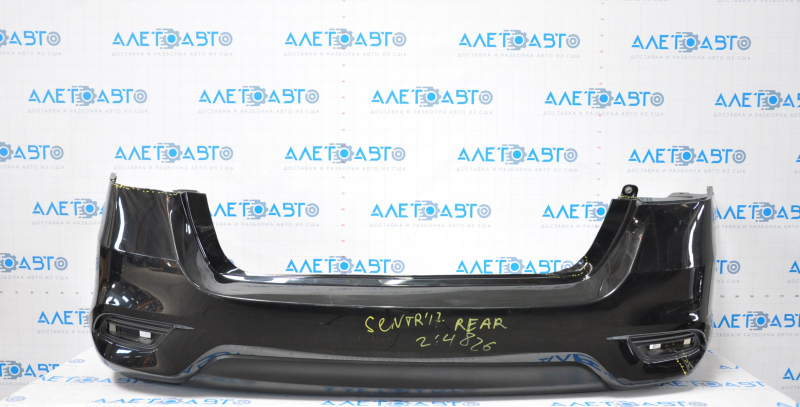 Bare rear bumper Nissan Sentra 16-19 rest black tear at the bottom, torn fasteners, sawed corner, dented