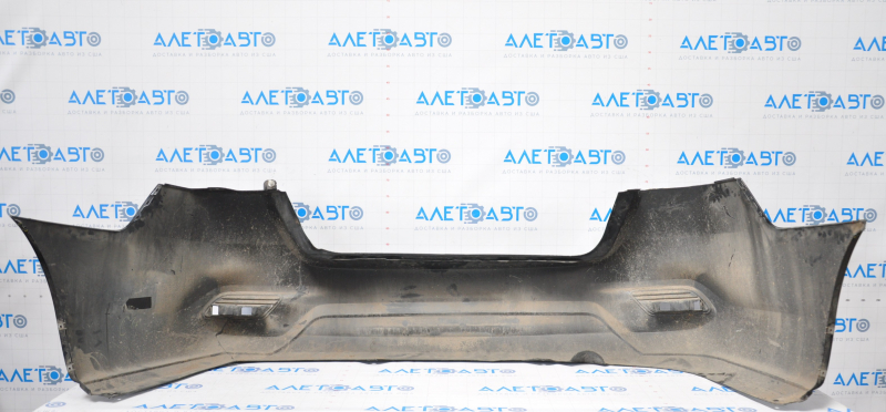 Bare rear bumper Nissan Sentra 16-19 rest black tear at the bottom, torn fasteners, sawed corner, dented