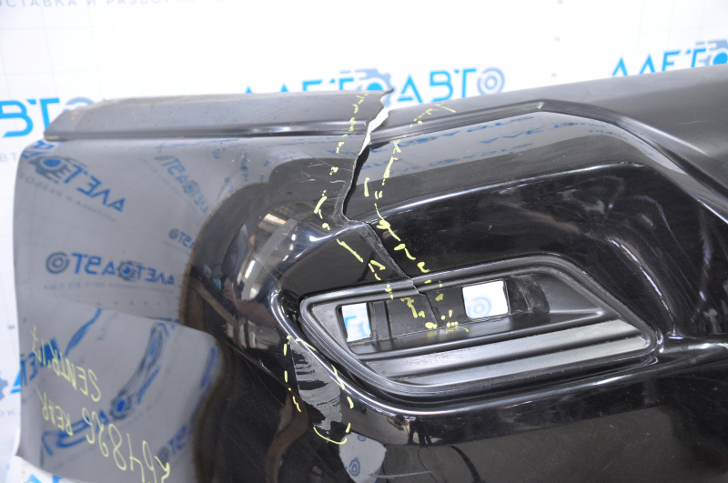 Bare rear bumper Nissan Sentra 16-19 rest black tear at the bottom, torn fasteners, sawed corner, dented