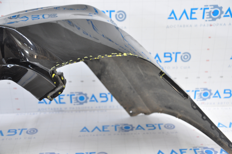 Bare rear bumper Nissan Sentra 16-19 rest black tear at the bottom, torn fasteners, sawed corner, dented