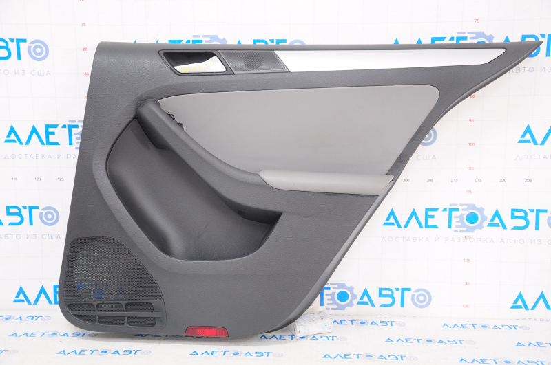 Door trim card rear right VW Jetta 11-18 USA black with gray chrome insert, leather defect