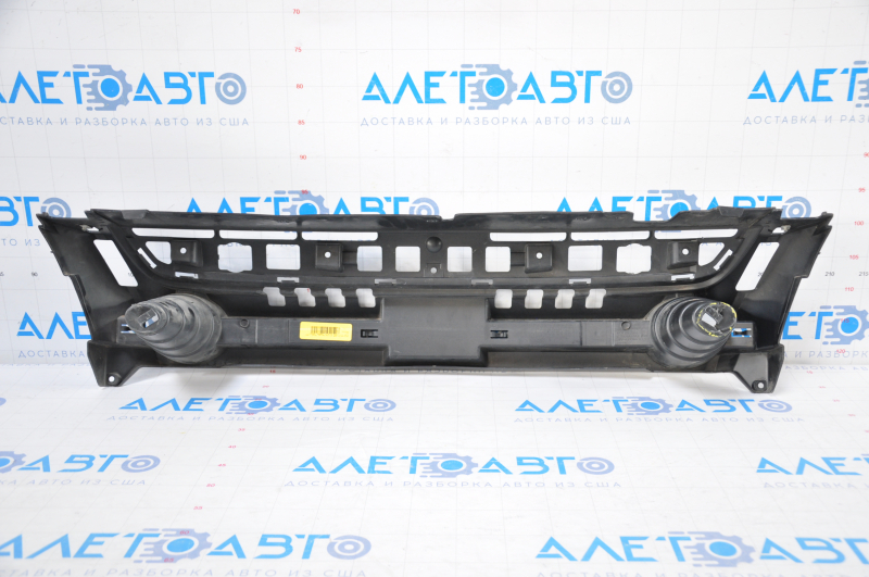 The radiator grille support Ford Escape MK3 13-16 pre-rest is dented, there are tears