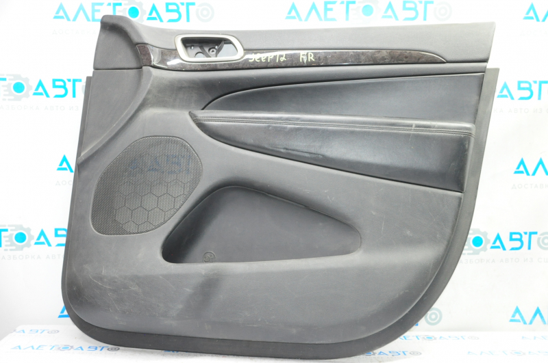 Door trim card front right Jeep Grand Cherokee WK2 14-17 black with black insert leather, armrest leather, black stitching, molding under black wood gloss, backlight, butt, scratches