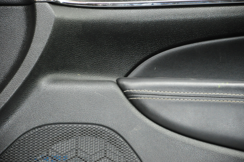Door trim card front right Jeep Grand Cherokee WK2 14-17 black with black insert leather, armrest leather, white stitching, molding with chrome, under matt black wood, backlight, scratches