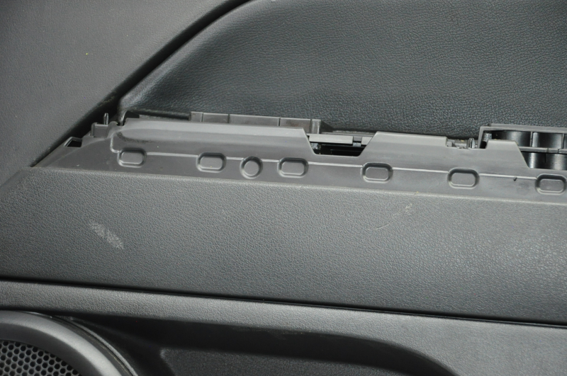 Door trim card front right Jeep Patriot 11-17 black with black insert leather, armrest rubber, scratches