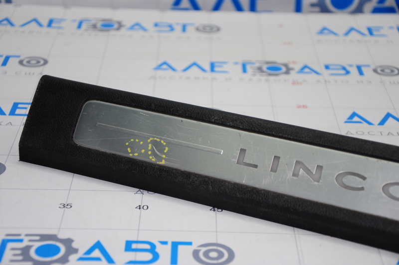 Door sill trim front right Lincoln MKZ 13-14 chrome with backlight black, bumps, scratches