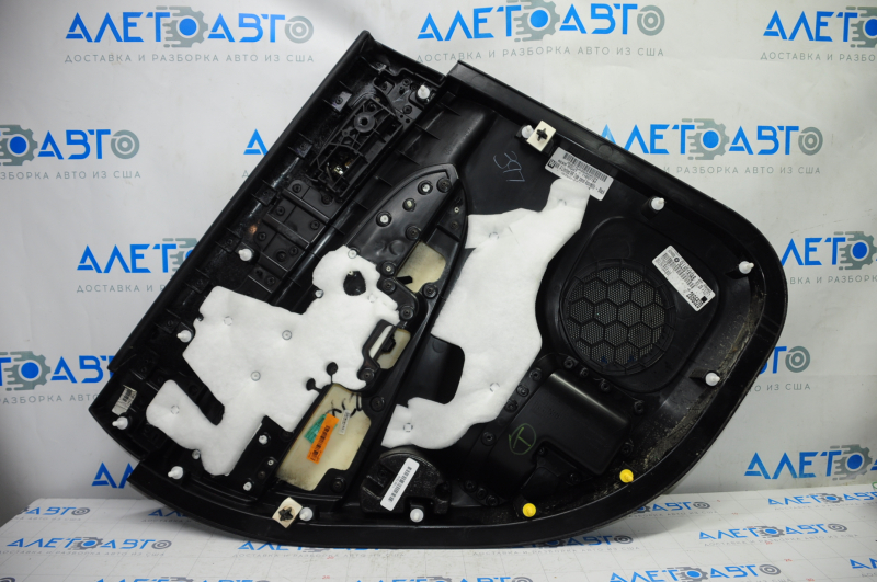Door trim card rear right Jeep Grand Cherokee WK2 14-17 black with black insert leather, armrest leather, white stitching, molding with chrome, under matt black wood, butts