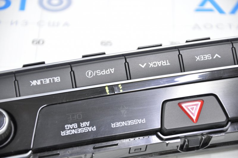 Hyundai Sonata 15-17 clock panel with radio control, crack in overlay, chrome chipped