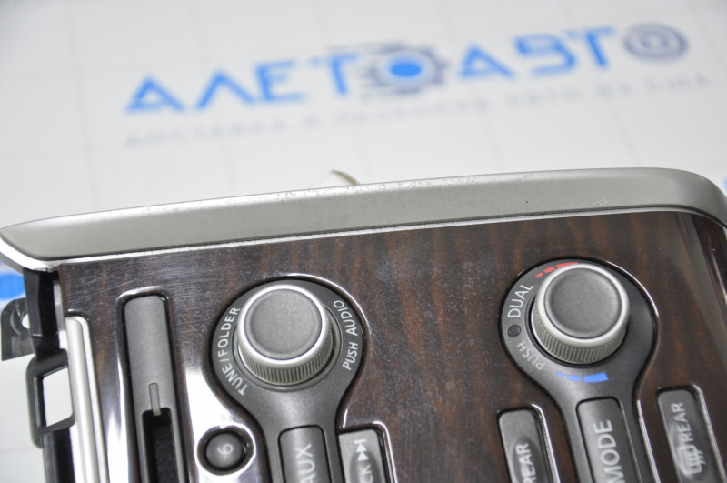 Climate control and audio control Nissan Pathfinder 13-16 under navigation, wood-like scratched and rubbed overlay