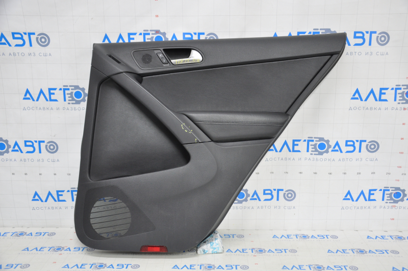Door trim card rear right VW Tiguan 09-17 black leather broken trim, scratches, whitened plastic, dented