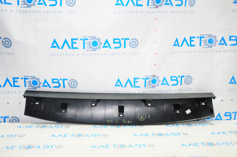 Upper trunk door trim VW Tiguan 09-17 black, scratches