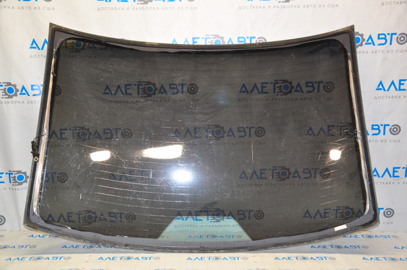 Rear glass VW Passat b8 16-19 USA tinted, chip cut off, scratches on the outer side and tint, air under the tint