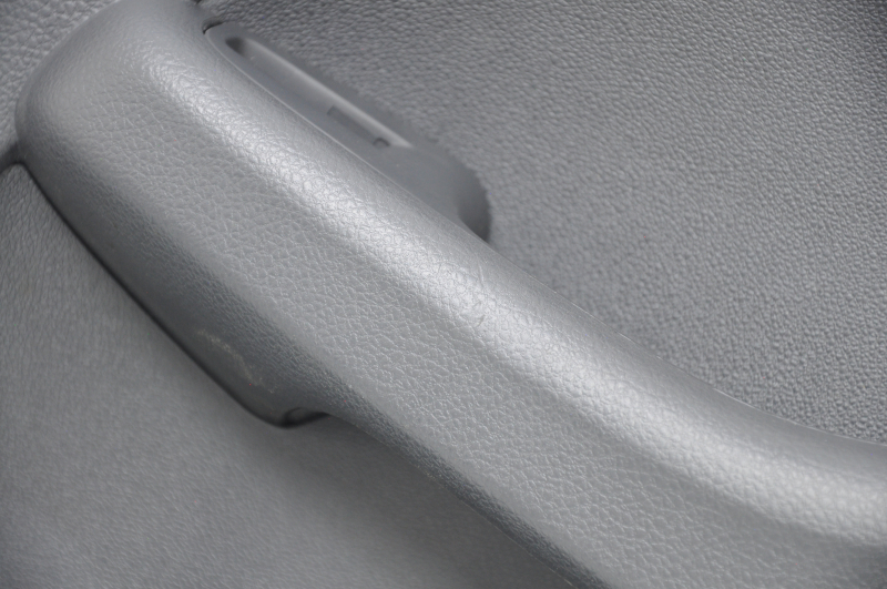 Door trim card front right VW Jetta 11-18 USA black, with black insert plastic, armrest leather, molding gray gloss type 1, scratches