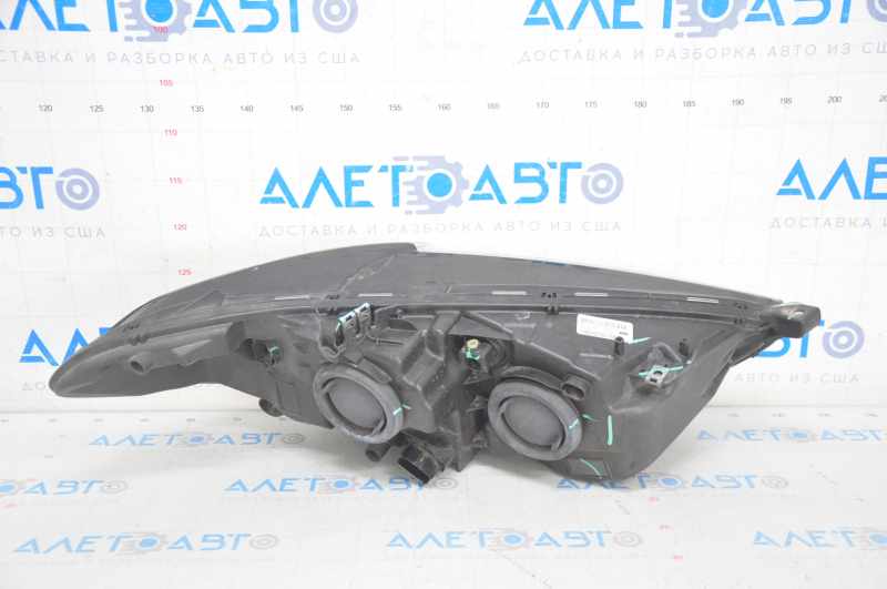 Headlight front left Ford Fusion mk5 13-16 sand, micro-cracks on glass