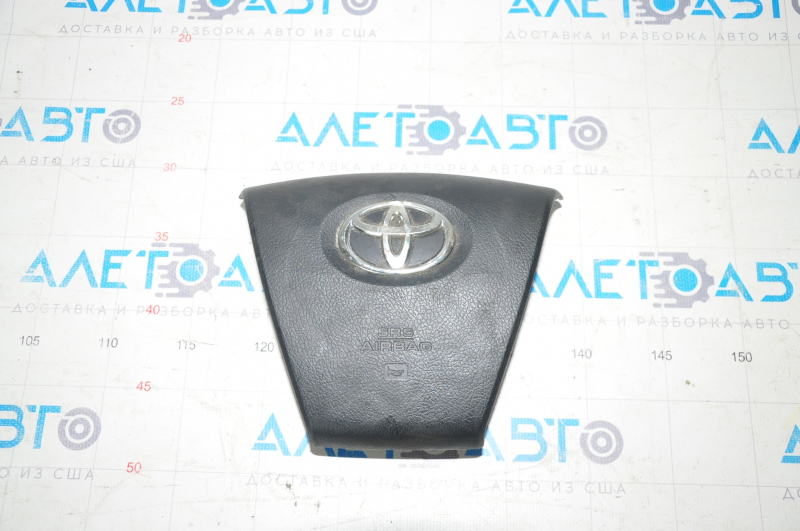 Airbag in the driver's steering wheel of a Toyota Camry V50 12-14 USA LE, chrome plated, rusty pyrotechnics