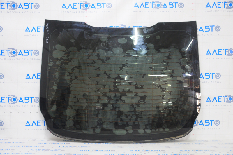 Rear glass Ford Fusion mk5 17-18 under the antenna, tint swelled