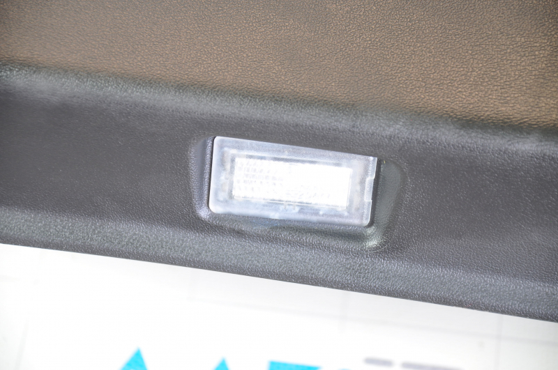 Door trim card front left Tesla Model Y 20 - black leather, with backlight, matte lining, with suede insert, with window lift control, with door opening button, varnish