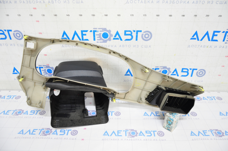 Front panel trim with air duct deflector left Toyota Sienna 11-14 beige, scratches