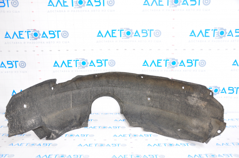 The rear right fender liner of a Toyota Camry v55 15-17 USA is torn.