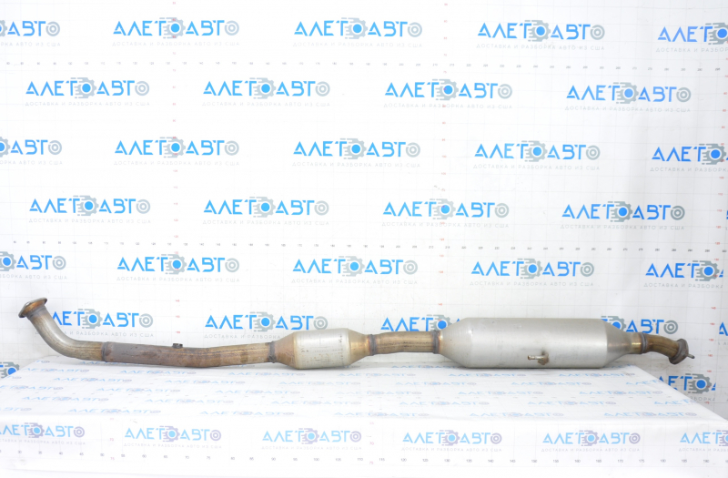 The intake pipe with the catalytic converter Toyota Avalon 13-18 2.5 hybrid is dented