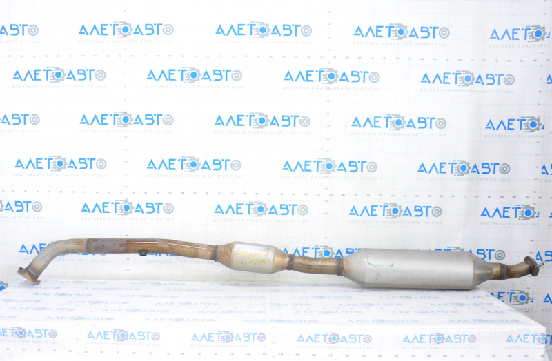 The intake pipe with the catalytic converter Toyota Avalon 13-18 2.5 hybrid is dented