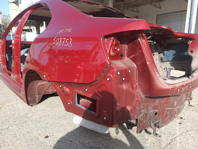 Quarter wing rear left VW Jetta 11-18 USA on body, red, dents