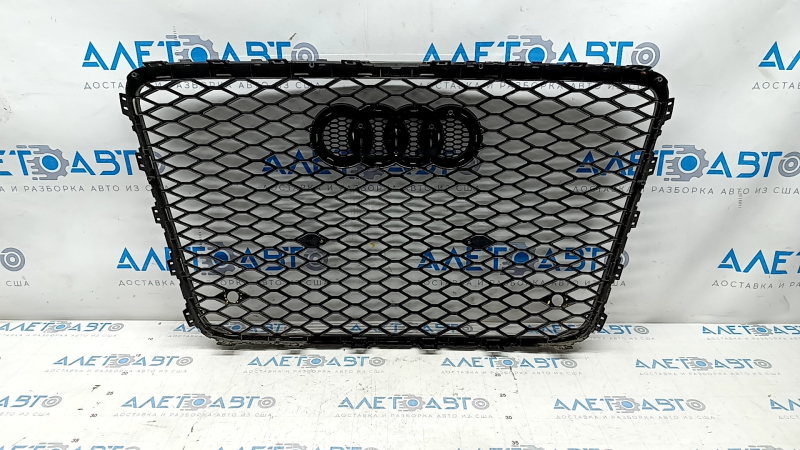Radiator grill Audi Q7 4L 10-15 black gloss, with emblem, parking brake light mounts are peeled off