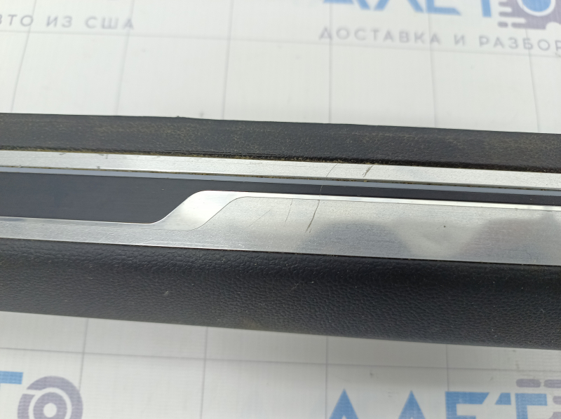 Right threshold trim VW Jetta 19- black with chrome molding and backlight, scratches, bump on the trim