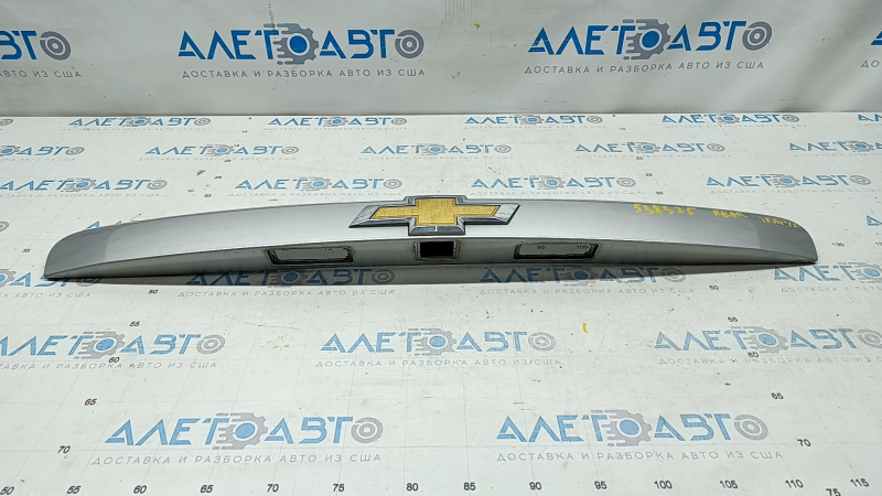Chevrolet Trax 17-22 trunk door trim with emblem, under camera, cracks in fasteners