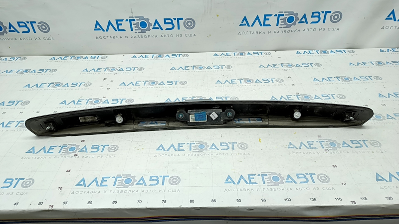 Chevrolet Trax 17-22 trunk door trim with emblem, under camera, cracks in fasteners