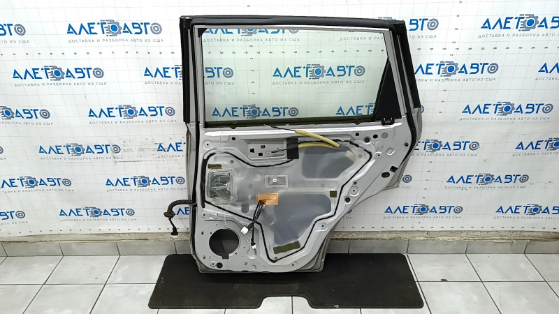 Door assembly rear right Nissan Rogue 14-20 silver K23, bumpers