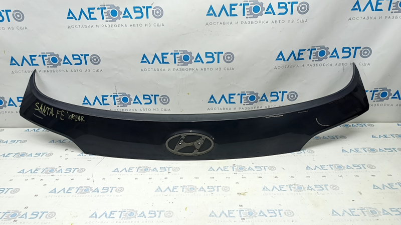 Hyundai Santa FE Sport 13-18 trunk door molding without emblem, cracked fastener