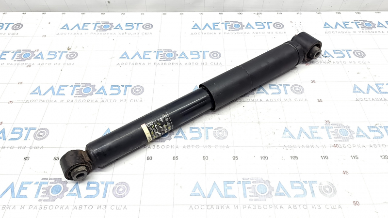 Rear shock absorber left Nissan Rogue 14-20 awd large silent block, dented, cracked silent